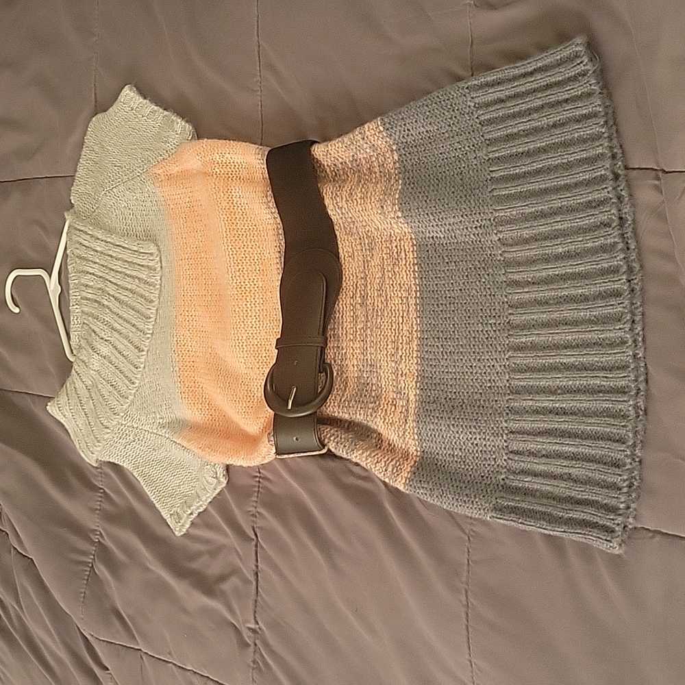 Sweater with belt.